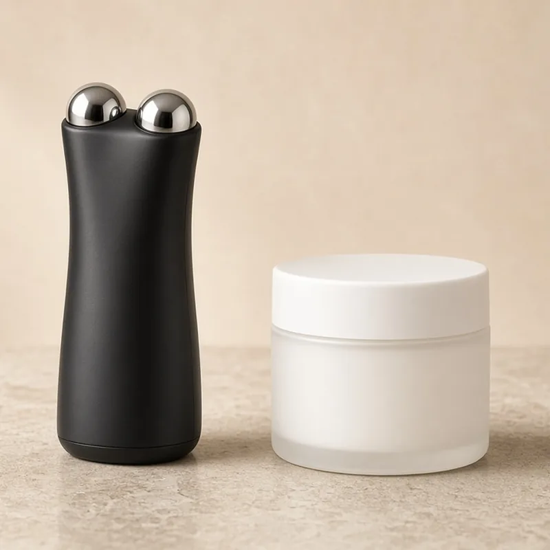 Illustration of a black handheld microcurrent device with two silver spheres beside a jar of gel